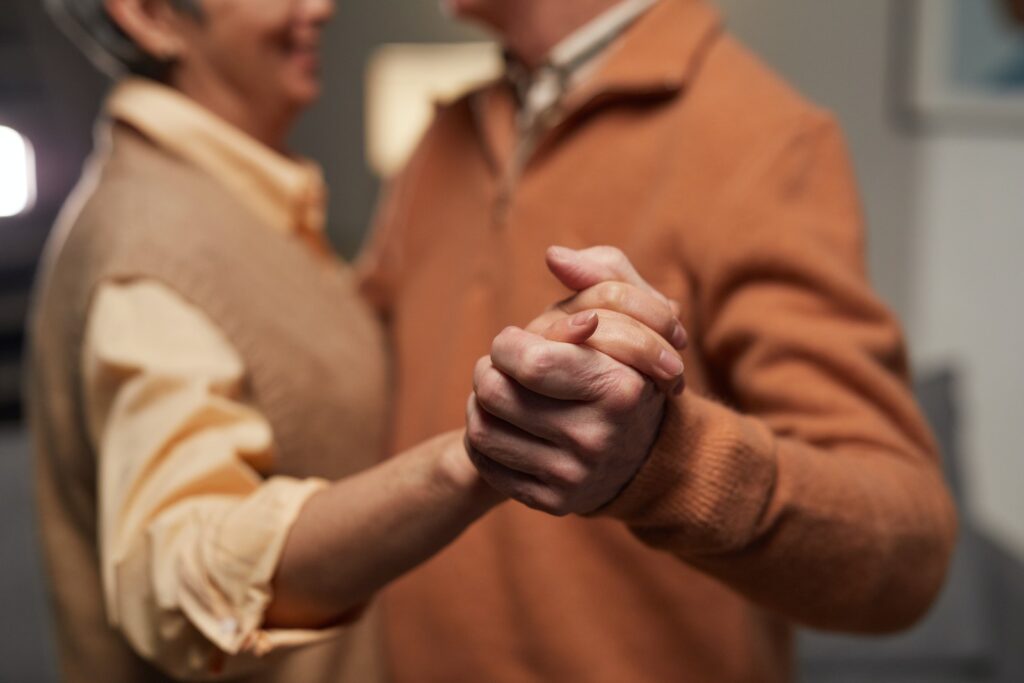 Couple Holding Each Other's Hands